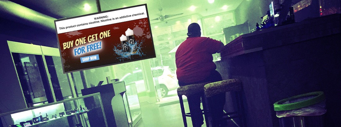 map sitting at vape bar with digital signage